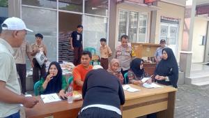 Bhabinkamtibmas Giat Pengamanan Distribusi Beras untuk Ketahanan Pangan Masyarakat